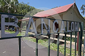 White Bangalow inscription on a weathered iron gate photo