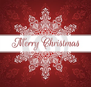 White banner with Merry Christmas text. Pattern in a shape of a snowflake on the red background.