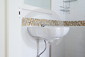 White basin in the bathroom,wash bowl in lavatory or toilet