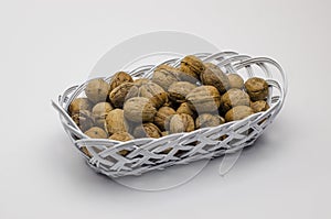 in the white basket are walnuts