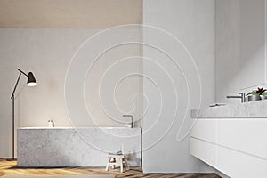 White bathroom, angular tub and sink