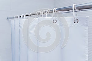 White bathroom with black and white shower curtain