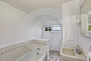 White bathroom interior in old house