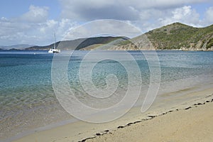 White Bay with a catamaran at anchor, Peter Island, BVI