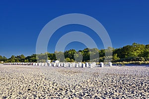 White beach chairs at the baltic sea