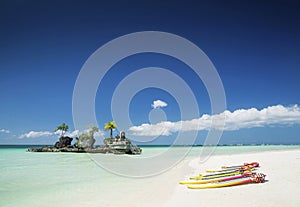 white beach and christian shrine and paddle boats on boracay tropical island in philippines photo