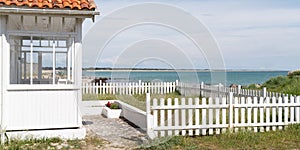 White beach house front of arcachon Bassin in cap ferret in France in web banner template