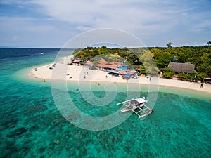 White Beach Moalboal in Cebu, Palawan,Philippines. Ocean Water and Beach.