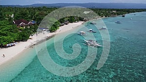 White Beach in Moalboal, Cebu, Philippines. Beautiful Landscape with Seashore and People in Background V