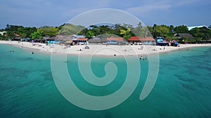 White Beach and Seashore in Moalboal, Cebu, Philippines. Beautiful Landscape with Seashore and People in Background IV