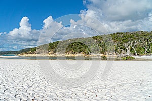 white beach of the Whitsunday Islands in Australia, which consists of 99 percent quartz sand, and the azure blue sea