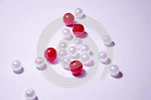 White beads. Cherry beads. Placer beads. Beads are bigger and smaller. Imitation pearls. Plastic beads. Placer beads. photo