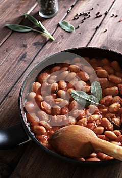 White beans in tomato sauce and herbs.