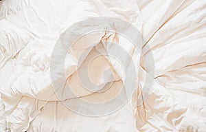 White Bed clothing In Mess High-Res .messy white blanket untidy, unmade bed sheet after waking up in the morning texture