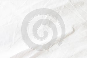 White bed sheet background with scratches from use with copy space.