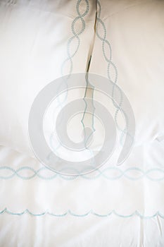White bed sheets on bed