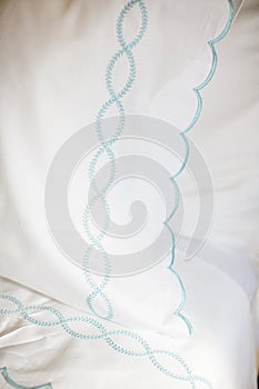White bed sheets on bed