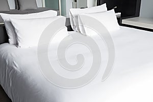 White bed sheets and pillows