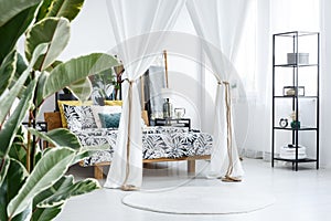 White bedroom interior with drapes