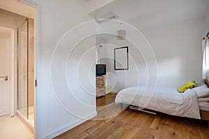 White Bedroom with oak flooring