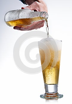 White beer bottle and glass