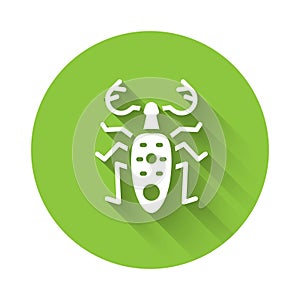 White Beetle deer icon isolated with long shadow. Horned beetle. Big insect. Green circle button. Vector