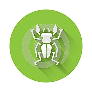 White Beetle deer icon isolated with long shadow. Horned beetle. Big insect. Green circle button. Vector