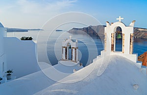 White belfries Santorini island, Greece