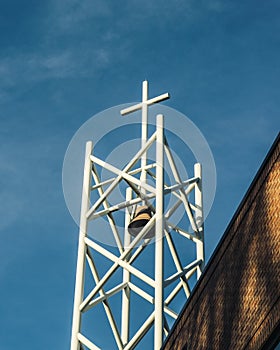 White Bell Tower with Cross at Top