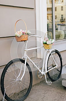 White bicycle with flower decor