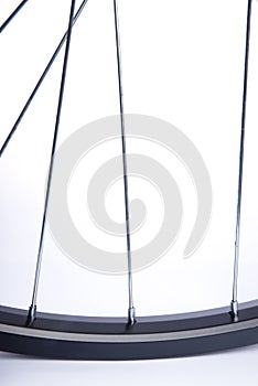 White Bicycle Wheel, Rim, Tyre and Spokes on Black Background