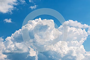 White big cloud against blue sky