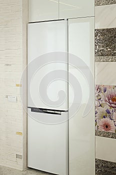 White big fridge in interior of kitchen