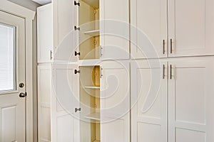 White big wooden storage combination for kitchen room