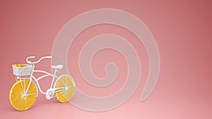 White bike with sliced orange wheels, healthy lifestyle concept with pink pastel background copy space