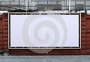 White billboards hanging on wall