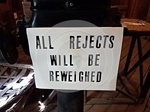 White and black all rejects will be reweighed sign