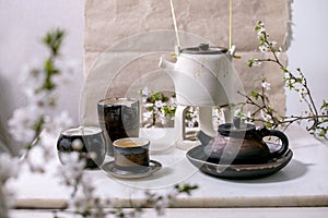 White and black handmade ceramic teapot for tea ceremony