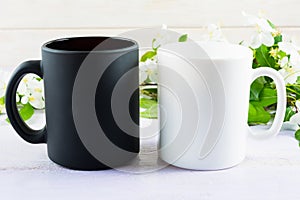 White and black mug mockup with apple blossom