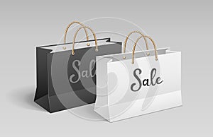 White and Black paper bag, Shopping sale, with rope handles, mock up design photo