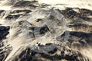 White and black sand beach