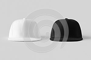 White and black snapback caps mockup on a grey background, front view