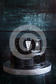 White and black tuxedo wedding or birthday cake