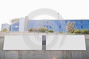 white blank billboards concrete wall front corporate building. High quality photo