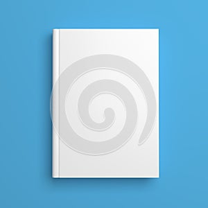 White blank book cover isolated on blue