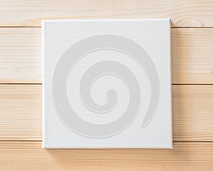 White blank canvas mockup square size on wood for arts painting and photo hanging interior decoration