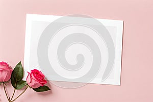 White blank greeting card on a pink background with flowers, love letter