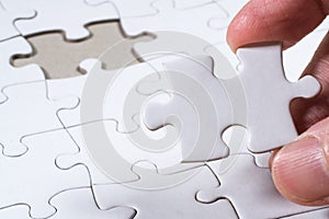 White Blank jigsaw puzzle, business concept of Solution