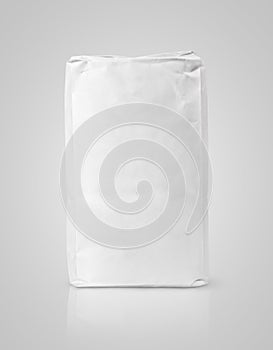 White blank paper bag package of flour on gray