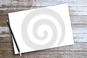 White blank paper or notepad with pencil